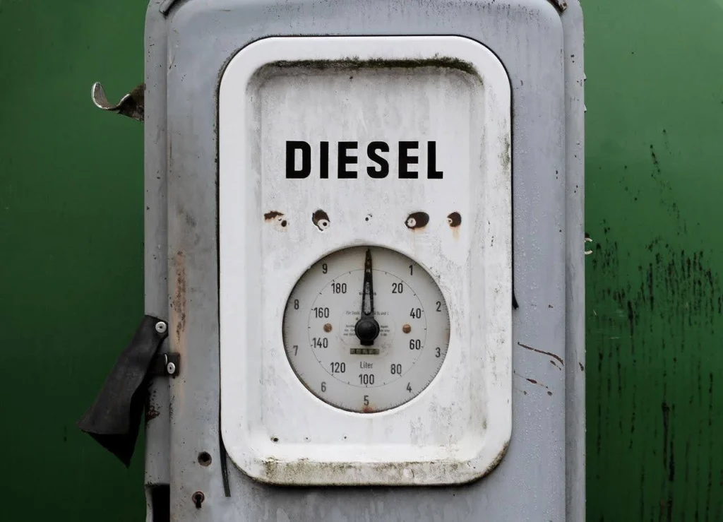 Old diesel fuel pump gauge showing liters