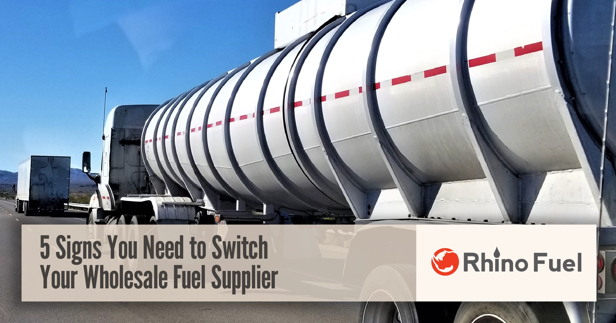 Bulk fuel tanker truck on the highway highlighting signs it’s time to switch wholesale fuel suppliers for your business.