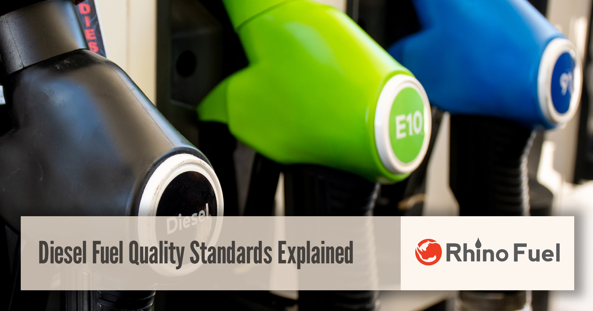 Diesel fuel quality standards explained with diesel, E10, and fuel pump nozzles at a fueling station.
