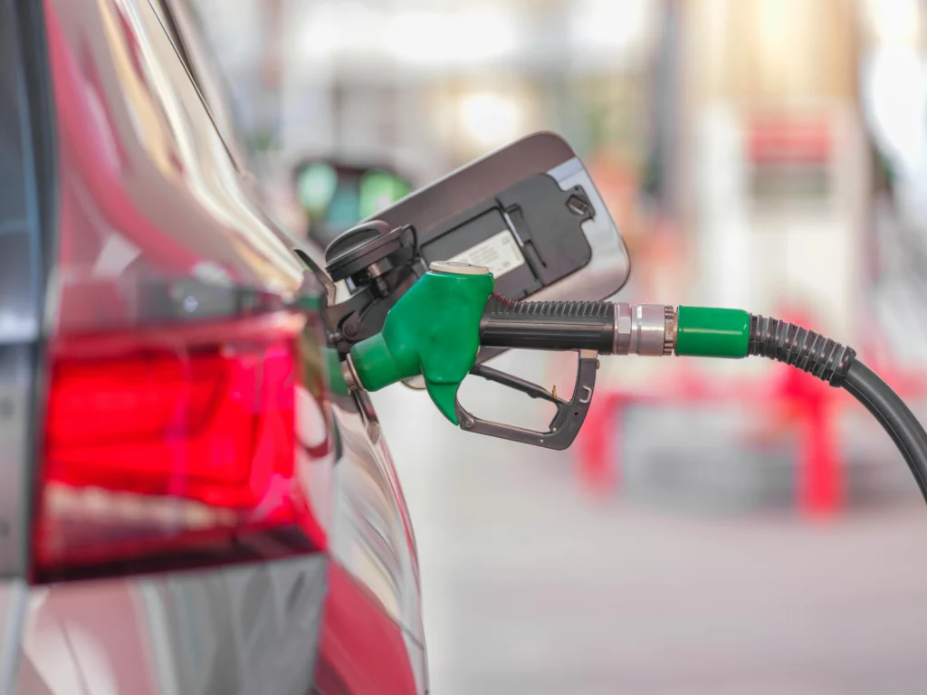 Car being refueled at gas station