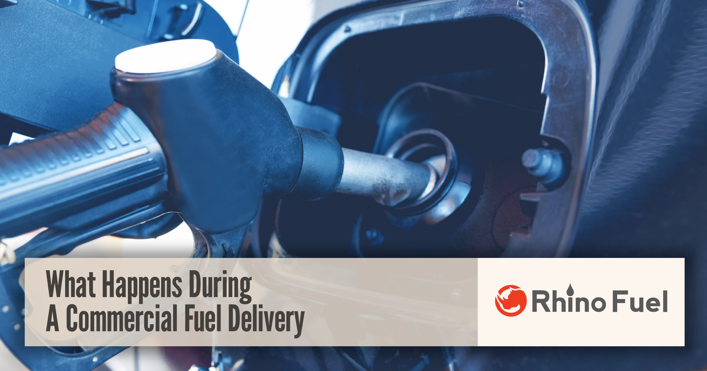 Close up of fuel nozzle during commercial fuel delivery to a vehicle at a job site.