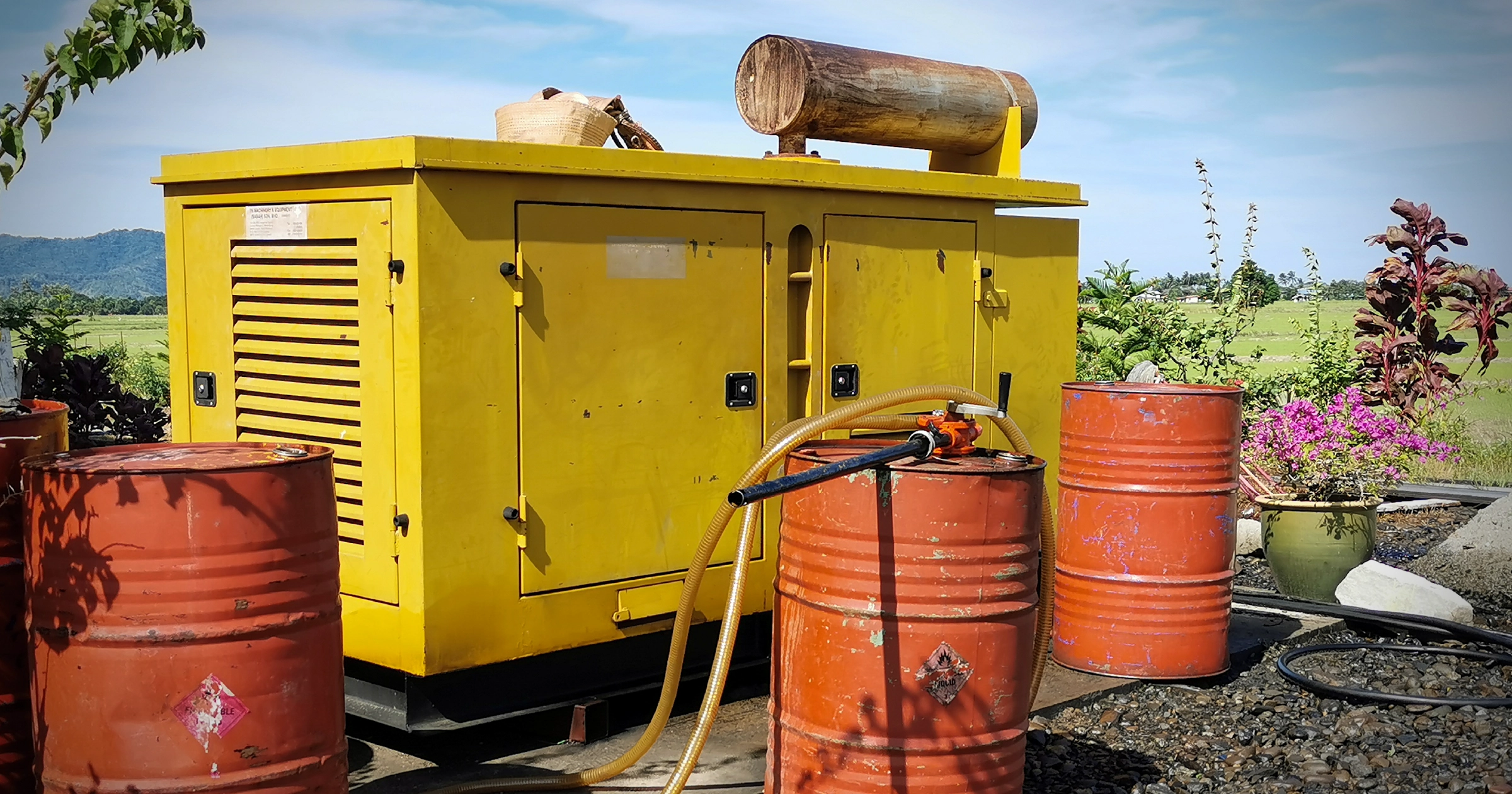 Fuel planning for generator backup with diesel barrels and fuel storage setup prepared for hurricane season