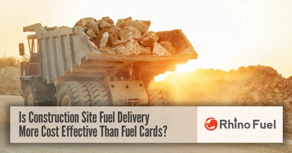 Construction site fuel delivery for heavy equipment with dump truck transporting materials on an active job site
