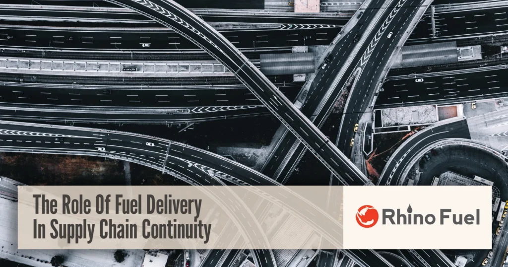 Fuel supply chain infrastructure with highway interchange showing the role of fuel delivery in maintaining supply chain continuity