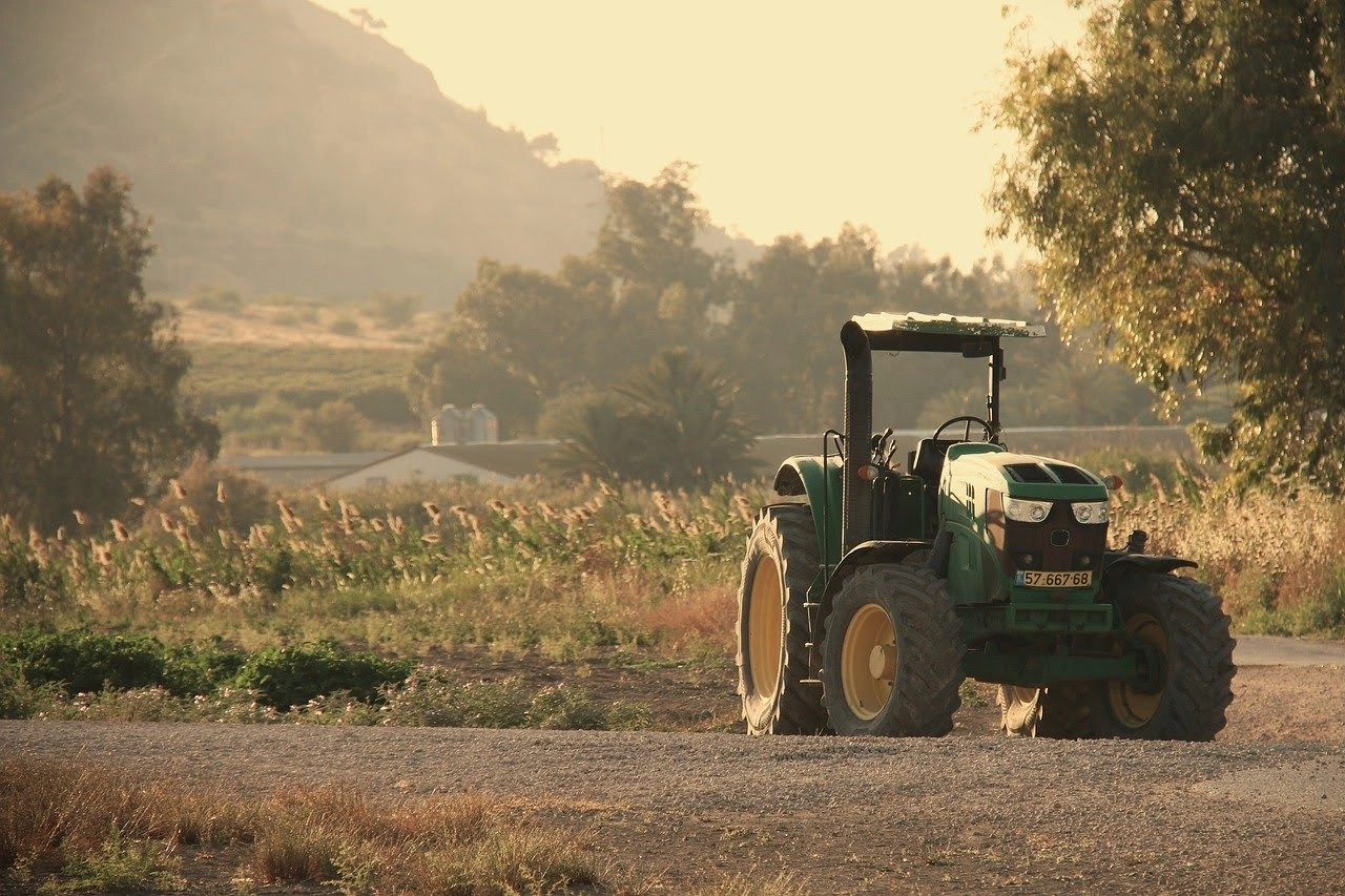 diesel-fuel-for-farm-use-tractor-field - Rhino Fuel Tractor working in a farm field using diesel fuel for farm use.