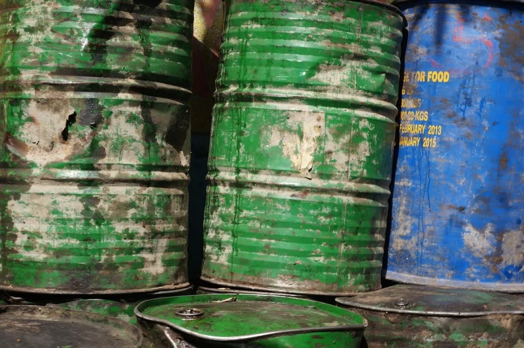 what-is-red-dyed-diesel-used-for-storage-drums - Rhino Fuel Old fuel storage drums showing how red dyed diesel is stored for off road equipment and commercial use.